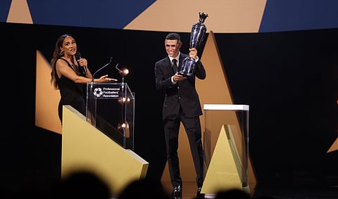 Manchester City forward Phil Foden with the PFA Player of the Year award