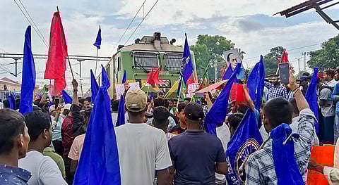 Bhim Army supporters block railway tracks in support of the Bharat Bandh call over the recent Supreme Court ruling on SC/ST reservations, in Arrah, Thursday, Aug. 21, 2024.
