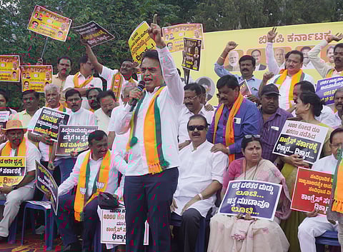 Ex-DyCM Dr CN Ashwath Narayan and other BJP leaders protest against CM Siddar-amaiah over the alleged MUDA scam in Bengaluru on Thursday