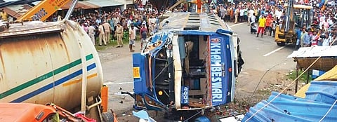 Two vehicles involved in the mishap being removed from the spot