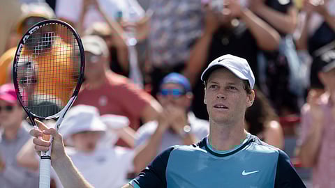 Italy's Jannik Sinner salutes the crowd after defeating Chile's Alejandro Tablilo during their match at the men's National Bank Open tournament