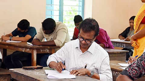 Actor Indrans writing his class VII equivalency exam at Government HSS, Attakulangara.