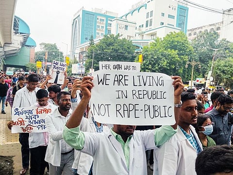 Doctors and medical students stage a protest demanding justice for the woman doctor who was allegedly raped and murdered at Kolkata's R G Kar Medical College and Hospital.