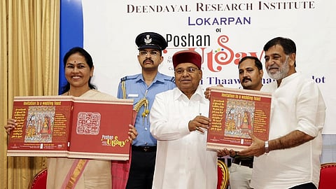 Governor Thaawarchand Gehlot inaugurates Poshan Utsav, a coffee table book, in Bengaluru.