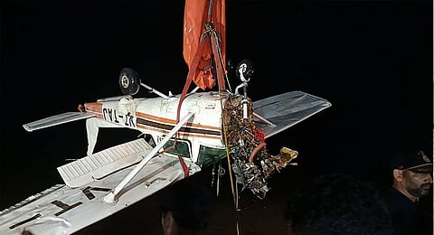 Indian Navy personnel pull out the wreckage of the missing trainee aircraft (Cessna-152 VT -Taj) from Chandil Dam under Saraikela -Kharsawan district of Jharkhand, Monday Night, Aug. 27, 2024.
