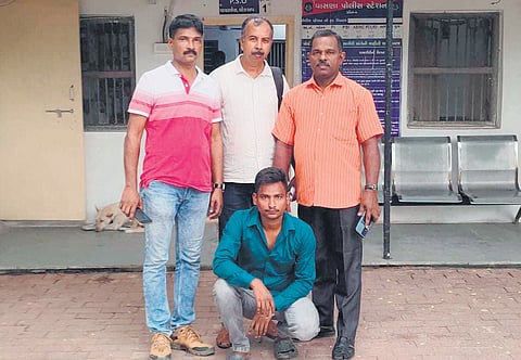 The Ernakulam rural police squad with the accused (sitting)