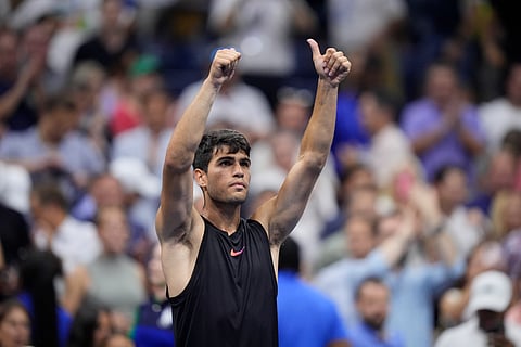 Carlos Alcaraz of Spain, reacts after defeating Li Tu, of Australia, during the first round of the U.S. Open tennis championships, Tuesday, Aug. 27, in New York. 2024.