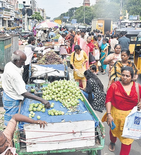 Petty shops on the roadside at Flower Bazaar in Chennai.