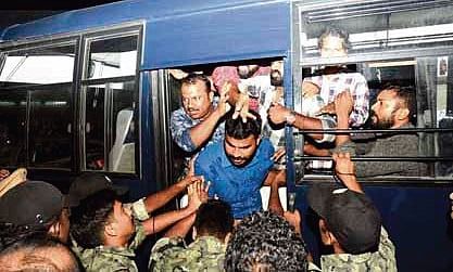 Police removing Congress workers protesting against Mukesh in Kollam