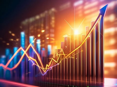 Sensex, Nifty close near their record highs