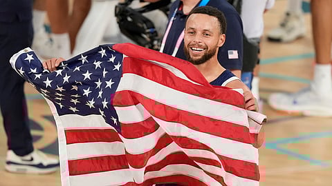 United States' Stephen Curry (4) reacts after winning a men's gold medal basketball game against France at Bercy Arena at the 2024 Summer Olympics, Saturday, Aug. 10, 2024, in Paris, France.