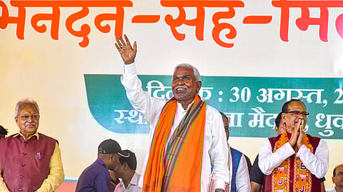 Former Jharkhand chief minister Champai Soren with Union Minister Shivraj Singh Chouhan and others after joining BJP during a ceremony, in Ranchi, Friday, Aug. 30, 2024.