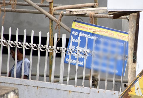 CCMSs plan approval notice board has been placed at the construction site in Coimbatore on Saturday.
