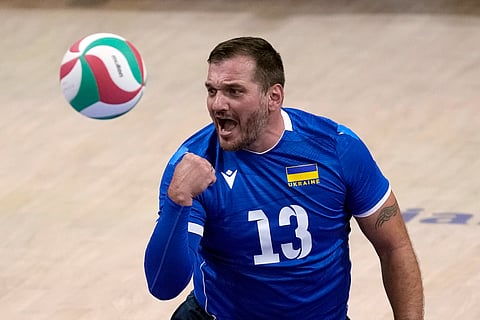 Dmytro Melnyk of Ukraine during the men's preliminary round sitting volleyball game against Iran at the 2024 Paralympics.