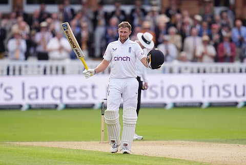 England's Joe Root celebrates after scoring a century during the second Test cricket match between England and Sri Lanka, at Lord's, in London, Thursday, Aug. 29, 2024.