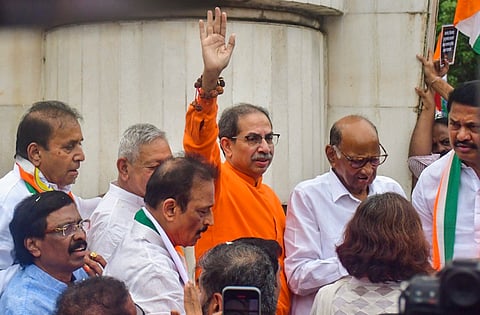 In this image from Sept. 1, 2024, NCP (SP) chief Sharad Pawar, Shivsena (UBT) chief Uddhav Thackeray, Congress State President Nana Patole and other Maha Vikas Aghadi leaders and workers are seen during a protest march at the Rajkot Fort.