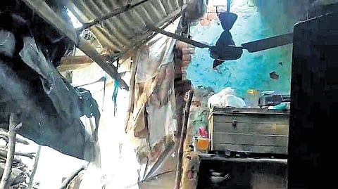 The wall of Basant Pradhan’s house which collapsed on Saturday night
