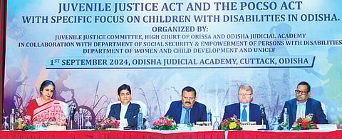 Dignitaries at the event in the Odisha Judicial Academy on Sunday