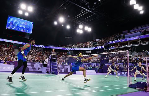 Badminton duo Satwiksairaj Rankireddy and Chirag Shetty in action during the men’s doubles quarterfinal against Malaysia’s Aaron Chia and Soh Wooi Yik in the Olympic Games Paris 2024, at La Chapelle Arena in Paris