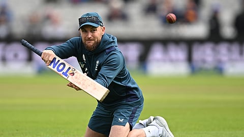 England's head coach Brendon McCullum runs a warm-up session during the fourth Ashes cricket Test match against Australia at Old Trafford cricket ground in Manchester, on July 21, 2023.
