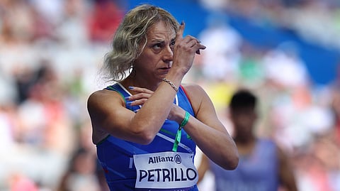 Italy's Valentina Petrillo prepares to compete in the women's 400m T12 round 1, at the Stade de France Stadium.