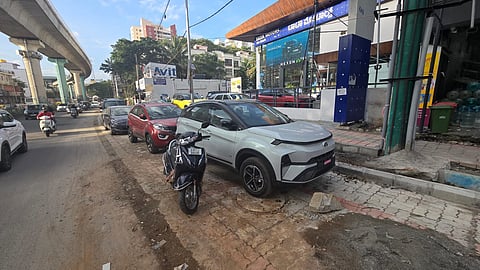 Showroom cars on the lane created as part of the High Density project on Kanakapura Road (Photo | Express)