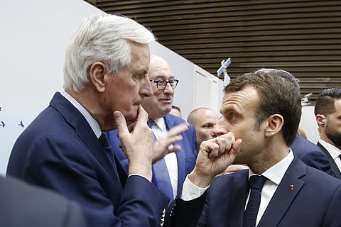 Emmanuel Macron and Michel Barnier.