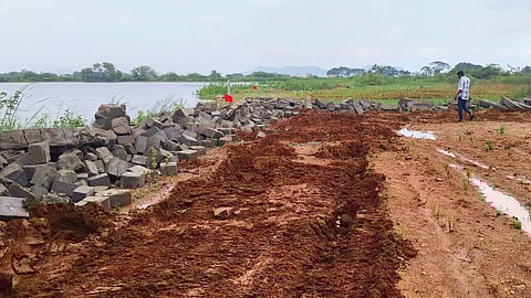 Authorities demolish an illegal structure at Bandampalli buffer zone area on the outskirts of Peddapalli district headquarters