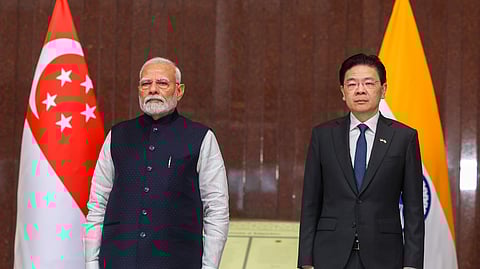 Prime Minister Narendra Modi with his Singapore counterpart Lawrence Wong during a ceremonial welcome, in Singapore.