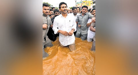 YSRC president YS Jagan Mohan Reddy visited the flood-affected areas in RR Peta of Vijayawada on Monday
