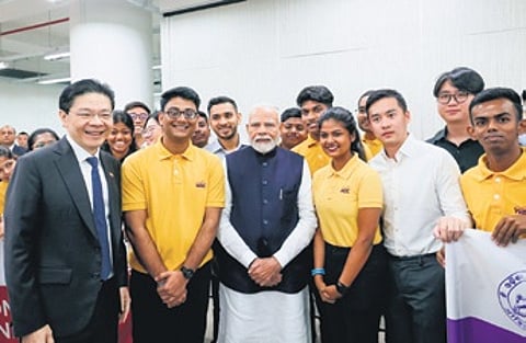 PM Modi and his Singapore counterpart Lawrence Wong with WSC interns