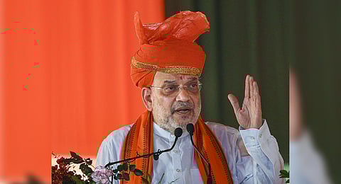 Union Home Minister Amit Shah addresses during a party worker meet ahead of Jammu and Kashmir Assembly elections, in Jammu.