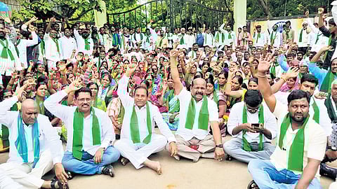 Farmers and BRS leaders stage a protest at the Sangareddy collectorate on Monday against the proposed pharma industry in Nyalkal mandal