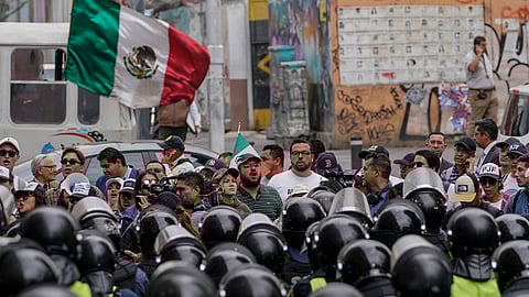 Demonstrators opposing judicial reform that would require all judges to stand for election, protest outside an alternate headquarters for senators in Mexico City.