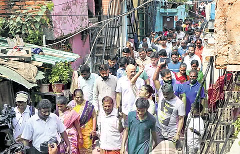 Senior AAP leader Manish Sisodia with Madrasi camp inhabitants