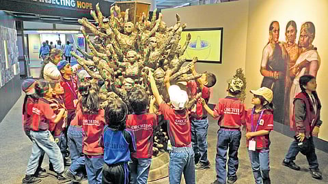 Tiny tots explore an art installation Through the Lens during the Vaccines Injecting Hope exhibition at Visvesvaraya Industrial and Technological Museum on Tuesday. The expo is on till February 28