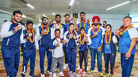 Swarmed by hundreds of supporters, garlanded and offered sweets, India’s Paralympic medal-winners returned to a jubilant welcome on Tuesday.