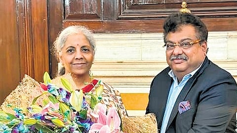 Minister MB Patil greets Finance Minister Nirmala Sitharaman in New Delhi on Tuesday