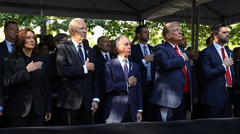 From left, Democratic presidential nominee Vice President Kamala Harris, President Joe Biden, Michael Bloomberg, Republican presidential nominee former President Donald Trump and Republican vice presidential nominee Sen. JD Vance, R-Ohio, attend the 9/11 Memorial ceremony on the 23rd anniversary of the Sept. 11, 2001 terror attacks, Wednesday, Sept. 11, 2024, in New York.
