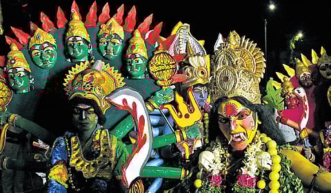 Donning mythological attire, performers take part in the Lord Ganesh idol immersion procession in Secunderabad on Thursday