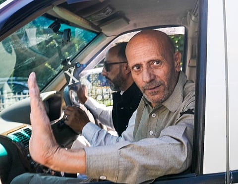 Baramulla MP Sheikh Abdul Rashid, popularly known as Engineer Rashid, leaves the Airport upon his arrival, in Srinagar, Thursday, Sept 12, 2024.