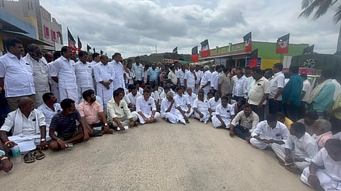 Munusamy and two more AIADMK MLAs sat on a protest on the Veppanahalli-Berigai road.