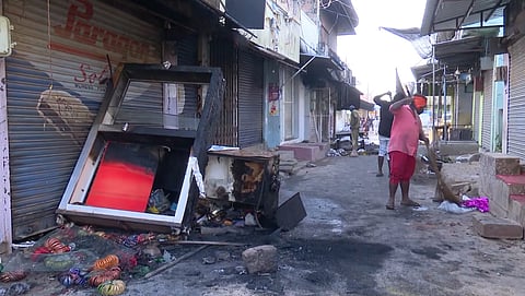 Charred remains of goods at a market following clashes between two groups during a Ganesh Chaturthi procession, at Nagamangala in Mandya district, Thursday, Sept. 12, 2024. (PTI Photo)