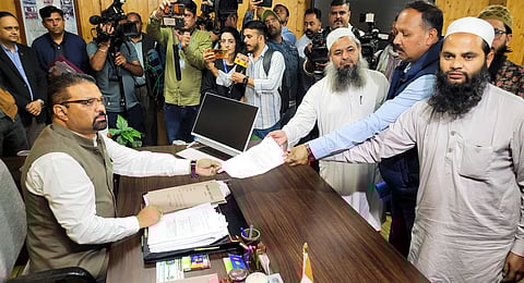 Representatives of Masjid committee submit a memorandum to the Shimla Municipal Corporation Commissioner Bhupender Kumar Attri over the alleged illegal structure in a mosque, at Sanjauli in Shimla, Thursday, Sept 12, 2024