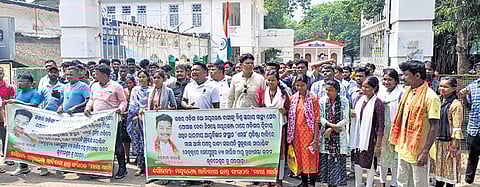 Tribal protesters taking out a rally in Baripada town on Friday.
