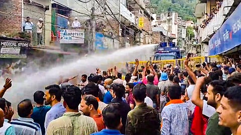 Water cannons being used on agitators during a protest over alleged illegal construction at a mosque in Shimla.