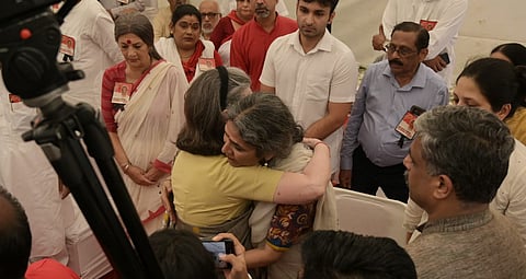 Sonia Gandhi with Sitaram Yechury's wife Seema Yechury, to pay last tributes at the party office in Delhi.
