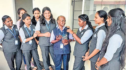 Thankamma P M with her classmates at VISAT College of Arts and Science at Elanji