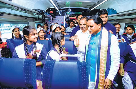 Chief Minister Mohan Charan Majhi interacting with students during his journey in Vande Bharat from Berhampur to Bhubaneswar on Sunday