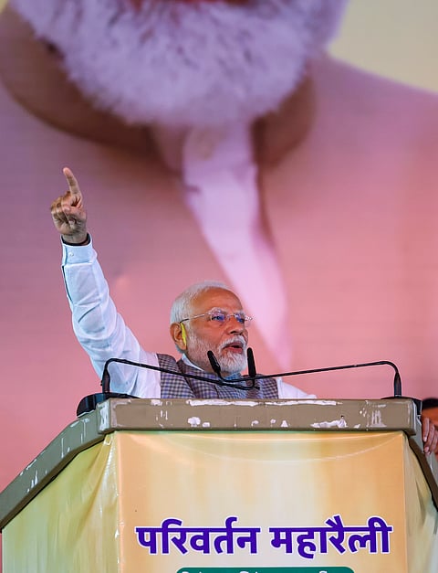 Prime Minister Narendra Modi addresses a public meeting, in Jamshedpur, Jharkhand.